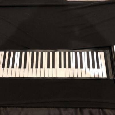 Play n Roll Piano from Sharper Image in Box