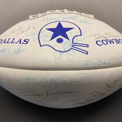 Dallas Cowboys Autographed Football Signed by
the Team
