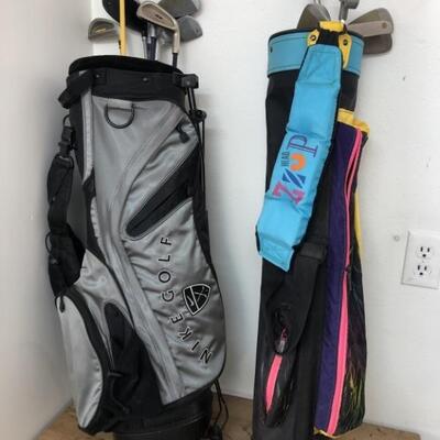 (2) Junior Golf Bags with Assorted Clubs