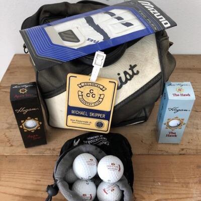 Golfers Lot: Big Bag of Practice Balls, 
A vintage Colonial Country Club Bag Tag
NIP ML Mizuno Golf Glove
Small Bag of Crown Plaza...