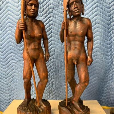 Polynesian male and female wooden statue