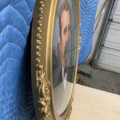 Oval gold frame with bubble glass. Nice pictures 