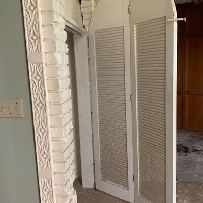 Very tall folding louver oval door