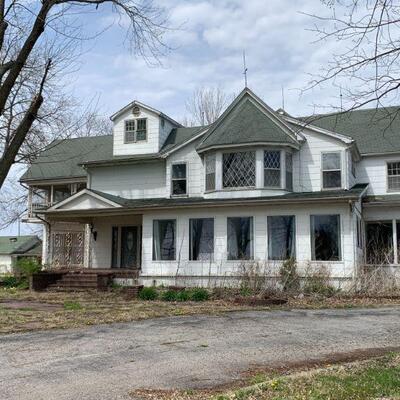 Front of house being demolished