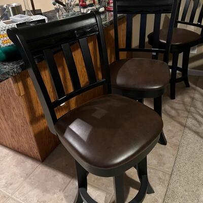 Set of four like new bar stools 