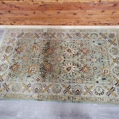 Oriental Green & Ivory Area Rug is 5ft x 8.5ft