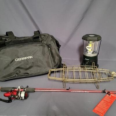 (4) Fishing Lot: 1- NWT Zebco Rod & Reel
1- Lantern
1- Fish Rack for Grill
1- Rolling Gear Bag