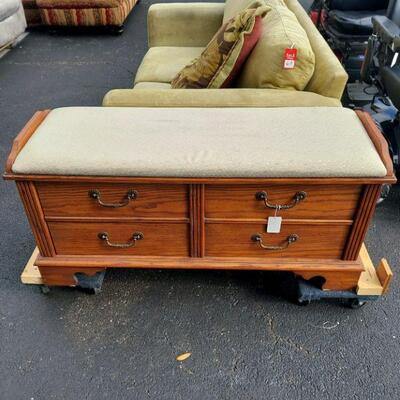 another cedar chest with a pillowtop