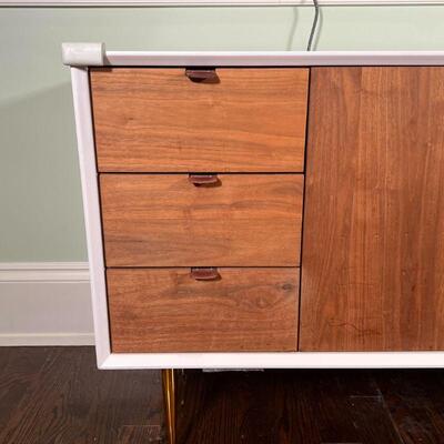 POST MODERN CREDENZA | White lacquered exterior with natural wood doors and drawer fronts, soft-close drawers, leather pulls, very unique...
