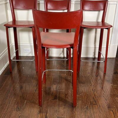 (4pc) RED LEATHER STOOLS | h. 36 x w. 16 x d. 16 in.