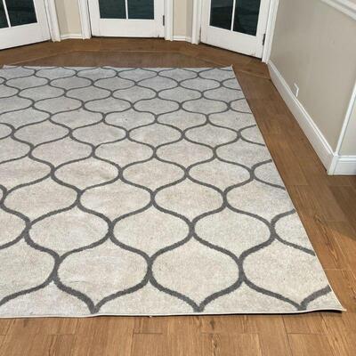 CONTEMPORARY CARPET | Grey pattern on a beige field; 7 ft. 10-1/2 in. x [some staining]