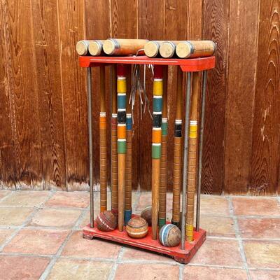 CROQUET SET | With old paint, complete; stand h. 28-1/2 x w. 17-1/2 x d. 9 in.