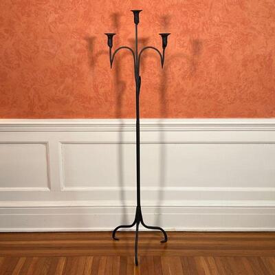 IRON TORCHIERE | Candle holder with three lights on a tripod base; h. 53-1/4 x w. 14 x d. 14 in.