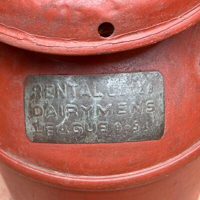 DAIRYMEN'S LEAGUE MILK JAR | Cast iron with red paint; h. 24 x dia. 12 in.
