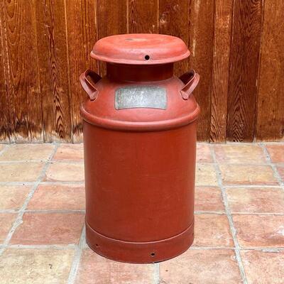 DAIRYMEN'S LEAGUE MILK JAR | Cast iron with red paint; h. 24 x dia. 12 in.