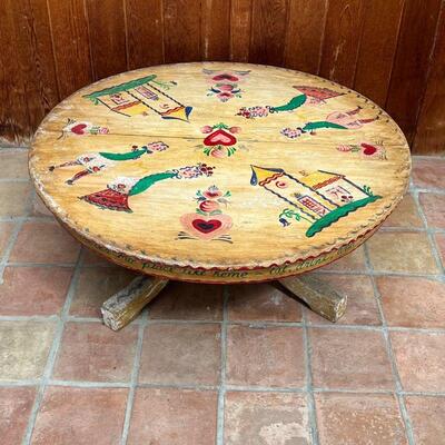 PETER HUNT LOW TABLE | Round top low table with overall paint decoration; h. 16-1/4 x dia. 42 in.