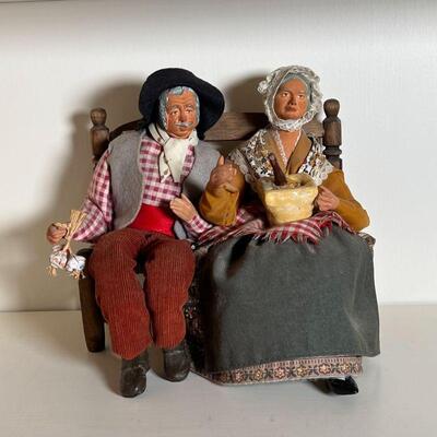 FRENCH TERRACOTTA FIGURE | Traditional French terra cotta Provence Santon doll of husband and wife farmers with detailed clothing, seated...