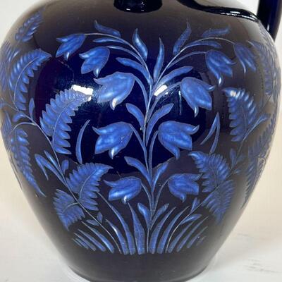 BURLEY & CO JAR | Blue pottery jar by Burley & Co Chicago, with paper label on bottom and stamped no. 448; h. 8 x w. 6 in