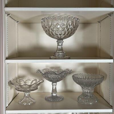 (4pc) PRESSED GLASS DISHES | Molded glass compotes; largest h. 10-1/4 x dia. 10-1/4 in.
