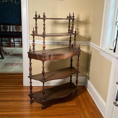 ANTIQUE ETAGERE | Turned and carved wood, on casters; h. 50 x w. 33-3/4 x d. 13-1/2 in.