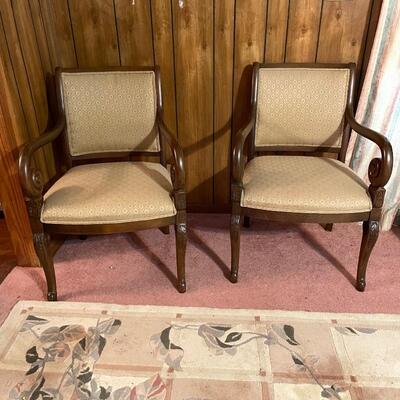 Pair of carved arm side chairs