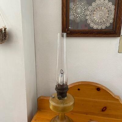 Oil lamp & framed needlework