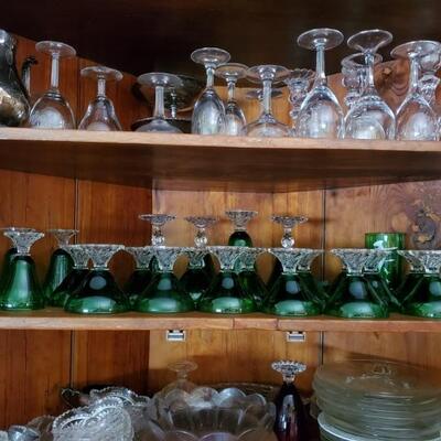 Assorted stemware including Anchor Hocking green â€œBoopieâ€ glasses with clear stems