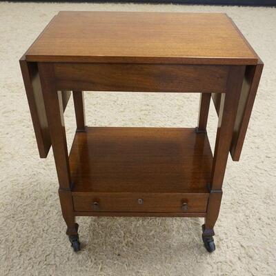 1075	MAHOGANY DROP SIDE, 1 DRAWER ROLLING SERVING CART, CLOSED APPROXIMATELY 25 IN X 16 IN X 31 IN HIGH, OPEN 50 IN WIDE
