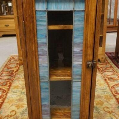 1045	NARROW WOOD CABINET W/LEADED GLASS DOOR & INTERIOR SHELVES, APPROXIMATELY 17 IN X 15 IN X 49 IN HIGH
