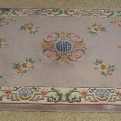 1062	PERSIAN THROW RUG, APPROXIMATELY 5 FT X 8 FT
