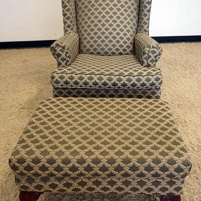 1066	KALUSSNER UPHOLSTERED CLAW FOOT WING CHAIR AND OTTOMAN
