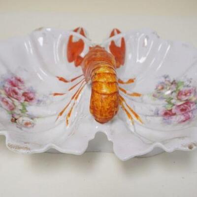 1006	VICTORIAN LOBSTER DISH HAS FLAKE UNDERNEATH THE BASE RIM, 14 IN WIDE

