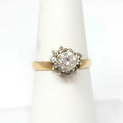 14k Gold Ring with Large Diamond and Diamond Accents, 2.9g
Weighs Approx: 2.9g Ring Size: 6.5.