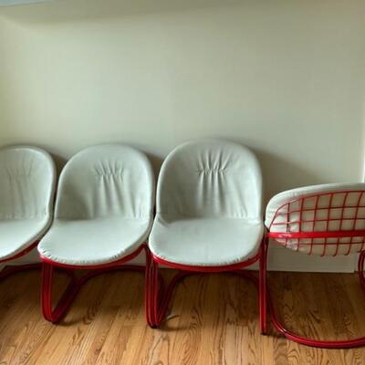 Set of 4 red metal chairs w/snap on leather pads 2 are sold