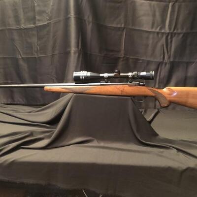 Ruger M77 338 Win Mag Rifle with Tasco 4-16x40