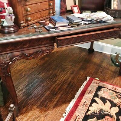 
Ornate Hand Carved Desk with lap drawer and Lions Feet (32x62x30)