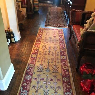 Large assortment of area rugs