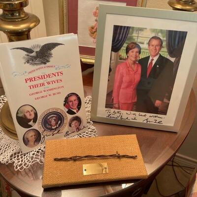 George & Laura bush signed picture

Bush signed book Wives of Presidents (signed by Laura & George Bush)