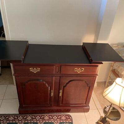 Ethan allen buffet on wheels and expandable top