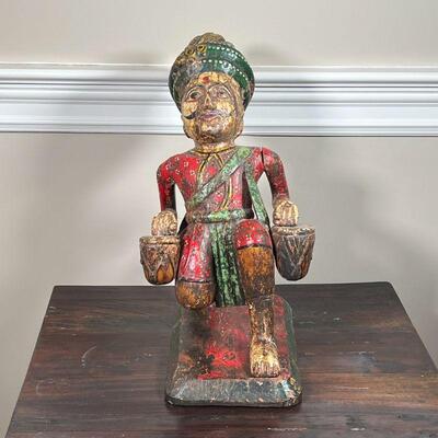 INDO-CHINESE CARVING | Polychromed and carved wood figure with drums; h. 19 x 10 x 12 in.