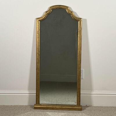 GILT BEVELED MIRROR | Beveled glass mirror in a fancy gilt frame; h. 47 x 20-1/2 in.