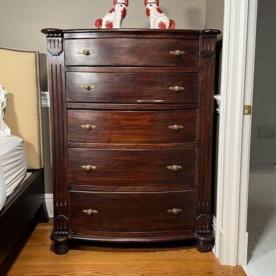 CARVED BOWFRONT TALL CHEST | Tall dresser; h. 55-1/2 x w. 42 x d. 25 in.