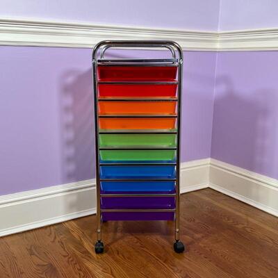 COLORFUL STORAGE DRAWERS | Rainbow plastic drawers on a chrome stand; h. 36 x w. 13 x d. 15 in.
