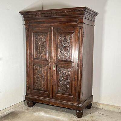 MEXICAN ROSEWOOD CARVED ARMOIRE | Intricately carved armoire / storage cabinet; h. 85 x 60 x 32 in.