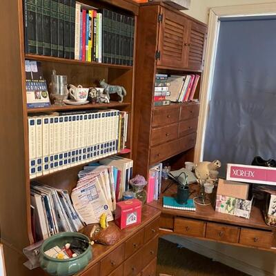Full wall of Ethan Allen book shelves