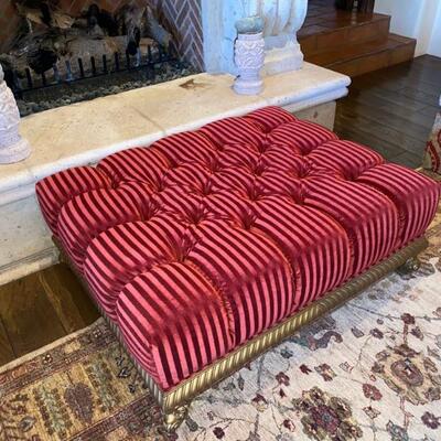 Red tufted ottoman-$950