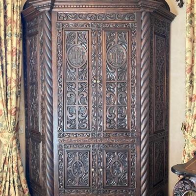 Corner carved Spanish armoire cabinet-$3,500
