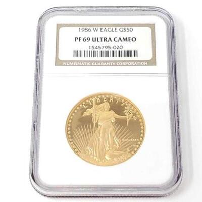 #1200 • 1 oz Fine Gold 1986 American Eagle $50 Coin Graded
