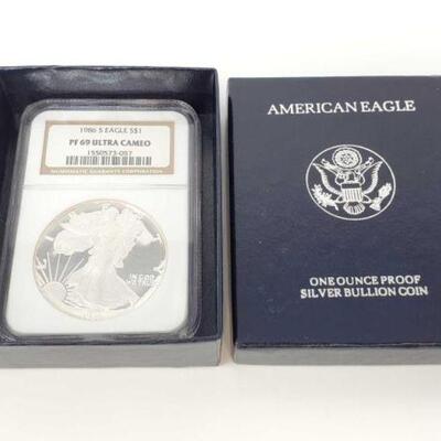#1204 • 1 oz Fine Silver 1986 Silver Eagle Coin in Box Graded