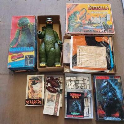 4076 â€¢ Vintage Godzilla Boxes and Figurines.